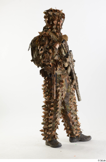 Frankie Perry Pose in Ghillie with Gun holding gun standing…